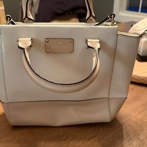 kate spade cream leather satchel with gold-tone accents